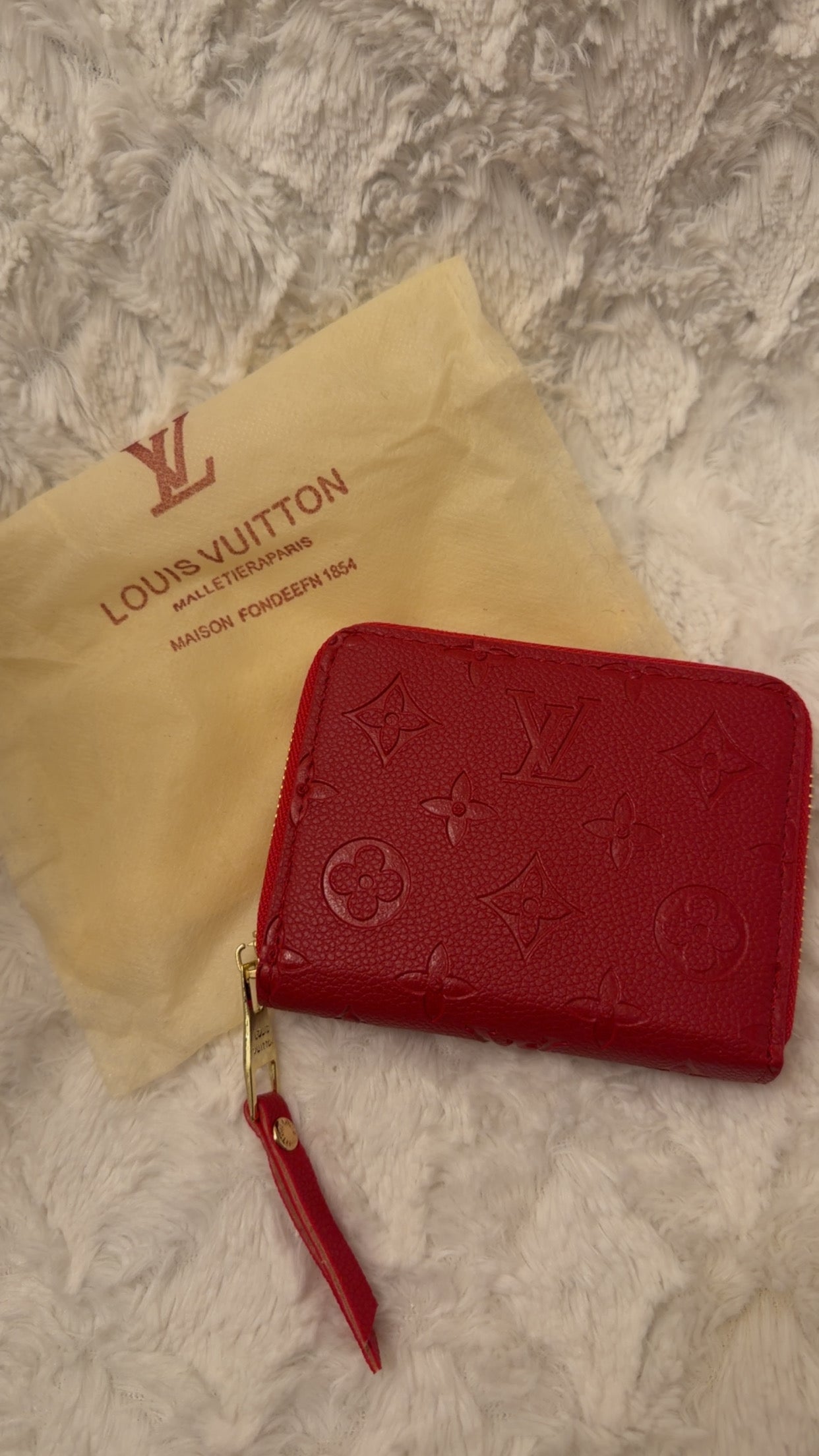 Embossed Zip Wallet